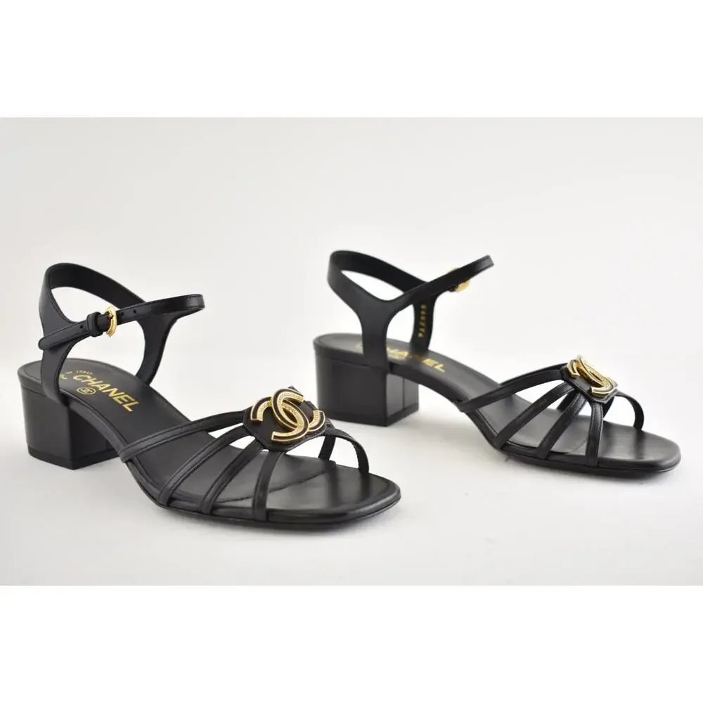 Chanel 25P Black Leather Crystal Gold CC Logo Ankle Strap Block Heel Sandal 37.5